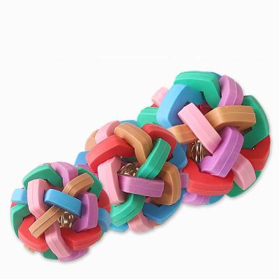 China Stored Products Pet Bite TPR Resistant Squeaky Colorful Bell Woven Ball Dog Toy Bite Tooth Cleaning Pet Resistant Grinding Toy for sale