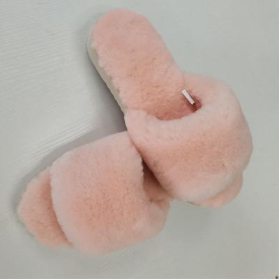 China 2021 Trend Fashion Lamb Fur Indoor Fluffy Slides Winter Sheepskin Fur Slippers Super Soft Slippers For Women for sale