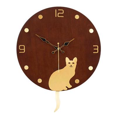 China Contemporary Solid wooden brass decorative silent brass living room clock Nordic deer head swing wall clock Quartz clock for sale