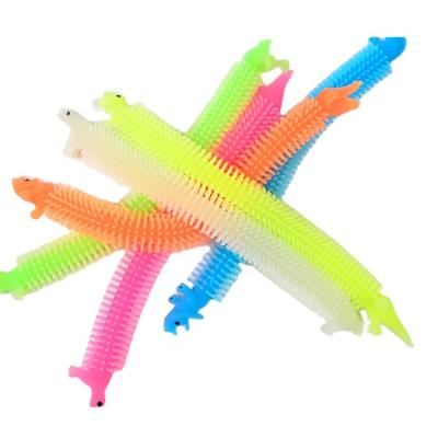 China TPR Makers Promote Popular Dinosaur Ramen Extruded Sensory Stretch Toys for sale