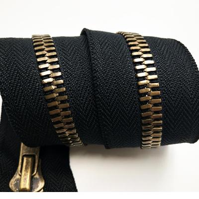 China Wholesale Custom Brass Other End 5# Narrow Metal Zipper For Skirt / Bag / Pocket Zipper for sale