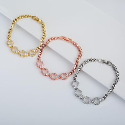 China Trendy Sweet Luxury Copper Plated Hollow Diamond Round Women Jewelry 18K Gold Bracelet for sale