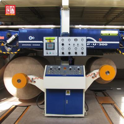 China GARMENT Cartoner Shaftless Hydraulic Mill Roll Stand for sale