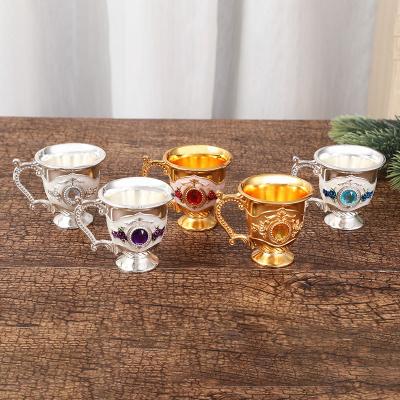 China European Creative Embossed Metal Flower Pattern Liquer Small Tumbler With Handle for sale