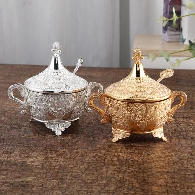 China Wholesale Steamable Metal Gold Round Sugar Pot Sugar Jar Bowl With Handle Lid Spoon Luxury Decorative For Home Hotel Sugar Jar for sale