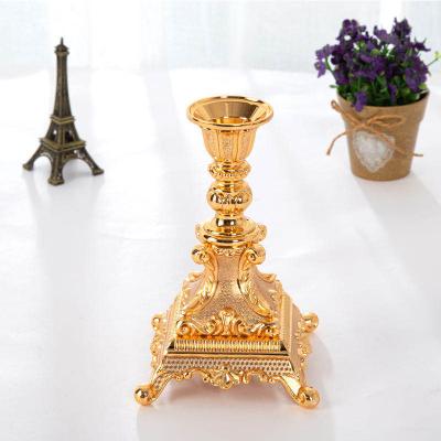 China Simple main European style pyramid candlestick main stand opens gold metal wedding decoration candlestick for sale