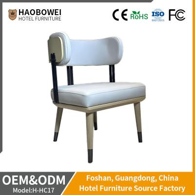 China Unfixed Leather Padded Hotel Dining Chair Furniture Wooden Framework for sale