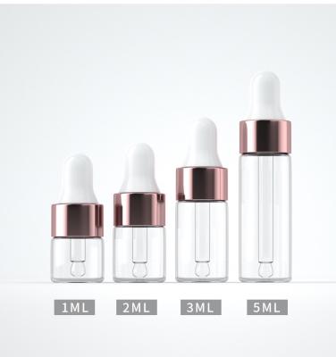 China Free Sample 1ml 2ml 3ml 5ml Cosmetic Clear Dropper Bottle 13mm Lid Serum Bottle Glass Dropper for sale