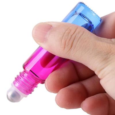 China Cosmetic hot sale 10ml essential oil cheap gradient ramp colorful roller bottle for sale