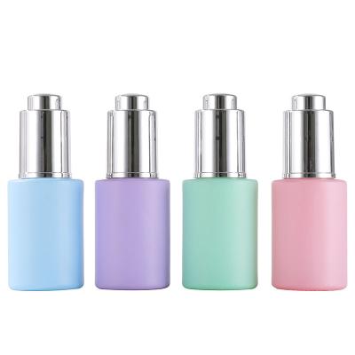 China Shoulder 30ml Custom Flat Cosmetic Serum Cylinder Push Button Dropper Glass Bottle for sale