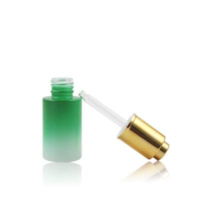 China 30ml Push Button Dropper Essential Oil Glass Cosmetic Bottles With Plated Dropper for sale