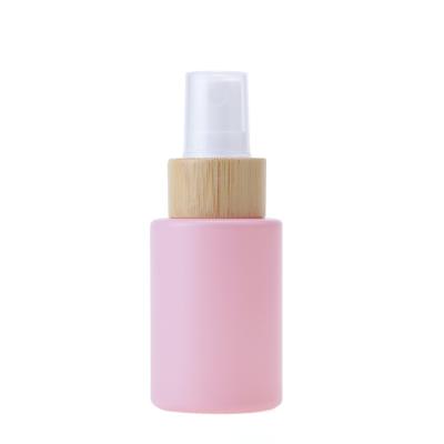 China Wholesale Cosmetic Refillable Glass Fine Mist Spray Bottle With Wooden Bamboo Cap for sale