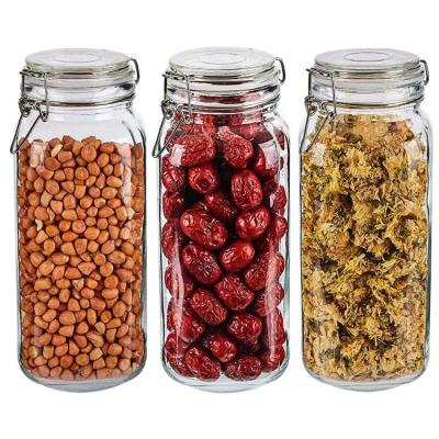 China Casual Hot Sell Storage Containers Food Round 64oz Glass Bottle Jar With Lockung Flange Lid for sale