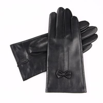 China Beautiful Single Bow Women's Top Grade Sheepskin Gloves for sale