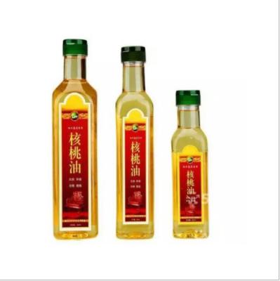 China Household Products 375ml 500ml Sunflower Oil Vegetable Oil Flower Logo Kitchen Seasoning Crystal White Roasted Glass Bottle for sale