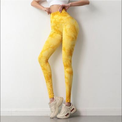 China Breathable Tie Dye High Waist Yoga Pants Peach Smile Hip Lift Women Sports Running Tights Fitness Pants for sale