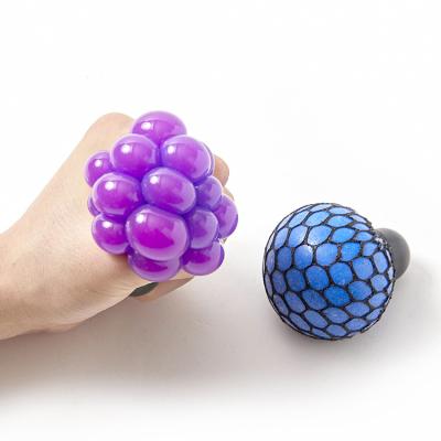 China Educational Toys in 2021 Newest Action Decompression Fun Prank Exhaling Duct Toy Grape Squishy Mesh Ball Squeeze Grape Stress Ball for sale