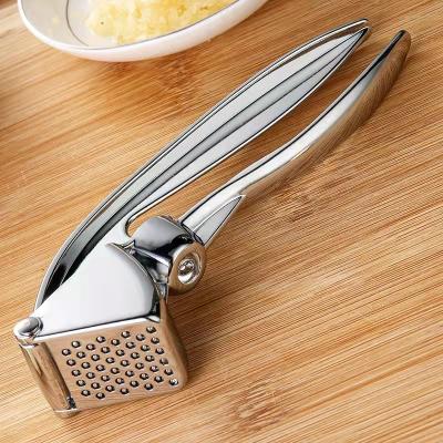 China Sustainable Stainless Steel Garlic Press Crusher Kitchen Cooking Vegetable Ginger Squeezer Masher Handheld Ginger Meat Grinder for sale