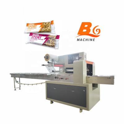 China Low Cost Food Back Seal Pouch Punch Energy Bar Cheese Wafers Honey Stick Jelly Sticks Wafers Packaging Packing Machine for sale