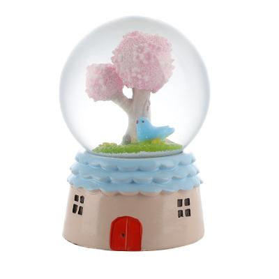 China Europe cartoon bird crystal ball resin animal crafts to install a girl's birthday gift wholesale snow globe for sale