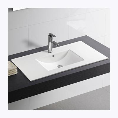 China Modern Factory Wholesale Ceramic Slim Edges Cabinet Bathroom Vanitys Wash Hand Basin for sale