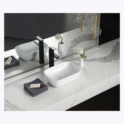 China Modern Wholesale European Sanitary Ware Fit Luxury Bathroom Sink Bowl White Ceramic Countertop Wash Basin for sale