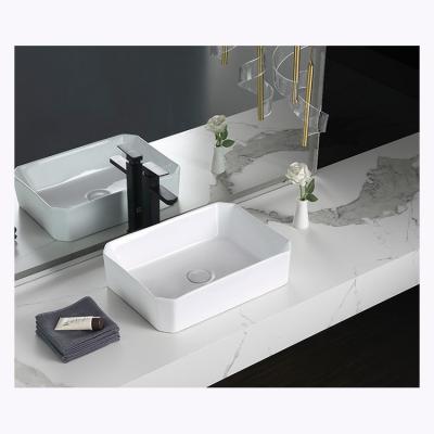 China Factory Direct Sale Modern Countertop White Ceramic Rectangular Bathroom Basin Sink for sale