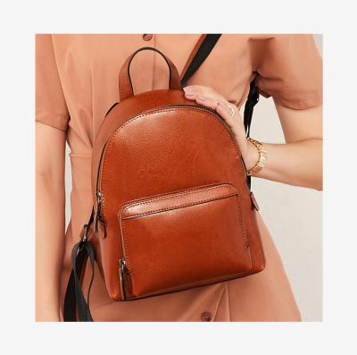 China High quality ladies student backpack 2021 new waterproof fashionable simple leather zipper backpack for sale