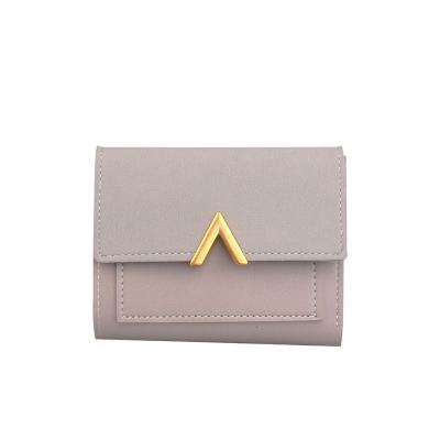 China New Waterproof Women's Retro Metal Short Wallet Spiking V Buckle Decorative Frosted Simple Wallet for sale