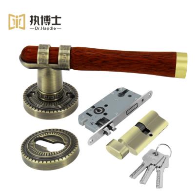 China Easy Installation European Furniture Gold Brushed Door Handle Springs Privacy Key Wood Door Handle With Key Lock For Home Interior Door for sale