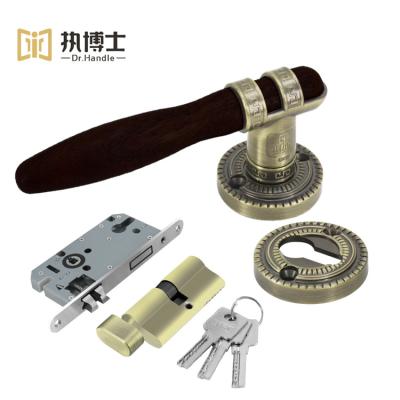 China Easy Installation Door Window Accessories Supply Zinc Alloy Soild Wood Tube Pull Door Passage Lock Door Lever Handles For Bathroom for sale