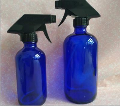 China Personal Care 500ml 16oZ Color Spray Glass Bottle Personal Blue Trigger Sprayer Bottle for sale