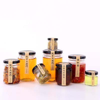 China 25ml 50ml 75ml 100ml 150ml 195ml 240ml 350ml 500ml Viable Jam Honey Sealed Storage Glass Jar Packing With Metal Lid for sale