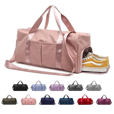 China Fashion New Logo Large Capacity Pink Duffle Customized Bags Gym Man Women Waterproof Sports Duffle Bag Small Duffel Bag for sale