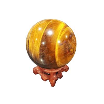 China Natural Crystal Tiger Eyes Spheres Citrine Ball Wholesale Crystal Gemstone Sphere 4-10cm Small for sale