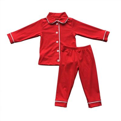 China Hot Selling QUICK DRY Christmas Kids Pajamas Plain Red Color Kids Pajamas Sets Girls and Boys Sleepwear for sale