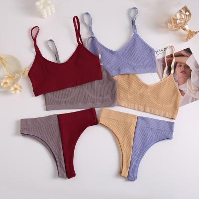 China Hot Selling Seamless Women QUICK DRY Top Set Low Waist Set Solid Color Women's Bra Halter Vest Underwear Set for sale