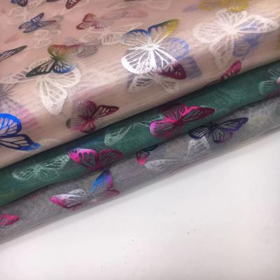 China Plain Glossy 100% Polyester 3 Yarn Thick Organza Foil Hot Stamping Apparel Dress Fabric for sale