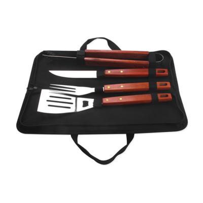 China Easily Cleaned 4 pcs wooden handle stainless steel bbq tool set with nylon bag for sale