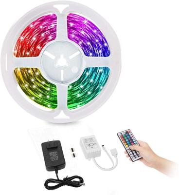 China Garden SMD5050 RGB color changing strip light, 24 /44 key remote controller, 12V 5A adaptor, 5 meters per roll. for sale