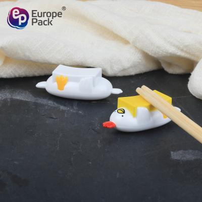 China Cute chicken shape Chopsticks frame en venta