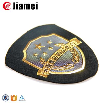 China high quality soft 3D gold metal sew on badges for combat uniform for sale