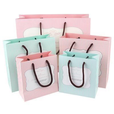 China Custom Manufacturers Wholesale Biodegradable Striped Christmas Birthday Gift Packaging Paper Bags for sale