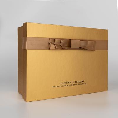 China Recycled Materials Gold Cardboard Shoe Storage Boxes Custom Rigid Ribbon Packing Box For Shoes Clothes for sale