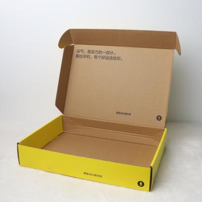 China Wholesales Biodegradable Customize Packaging Boxes Logo Printing Yellow Gift Paper Folding Cartons Clothes Box for sale