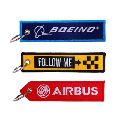 China Promotion gift no moq brand logo flight aviation embroidery anime tag main chain custom fabric woven patches for sale