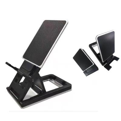 China Super Thin Aluminum Height Mini Desktop Mobile Phone Tablet Adjustable Foldable Slim Stand for sale