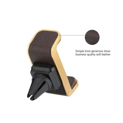 China Soft Leather Matching With Your Car Universal 360 Rotating Car Air Vent Mount Handle Mobile Phone Holder Soft Leather Holder for sale