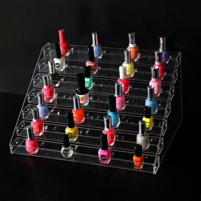 China Large Capacity 7 Tiers Eco-friendly Nail Polish Table Display Stand Clear Acrylic Rack for sale