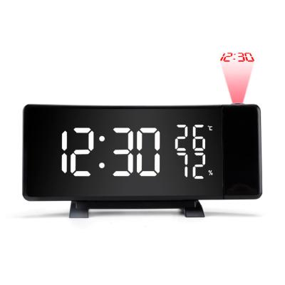 China New Design Factory Best Radio Projector Table FM Radio Wholesale Alarm Clock With Dual USB Charging Port for sale